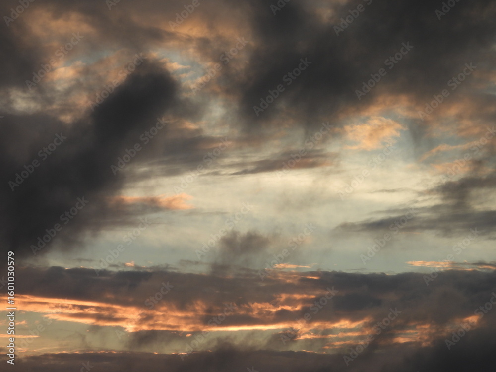 Naklejka premium Colorful, evening, storm clouds at sunset, Kent County, Delaware. Natural cloudscape. Remnants of Tropical Storm Debby.