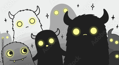 Cute cartoon monsters with glowing eyes
