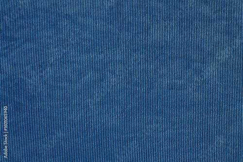 Konstfotografi Blue textured fabric with fine vertical lines in detailed close-up view