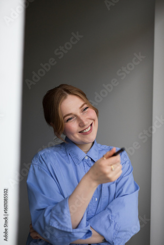 young woman watching tv