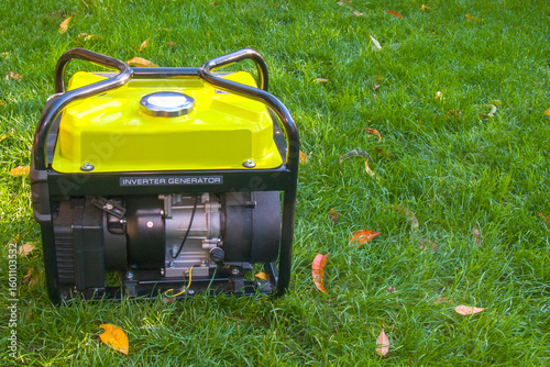 Yellow Inverter Generator on Grass: Reliable Power
