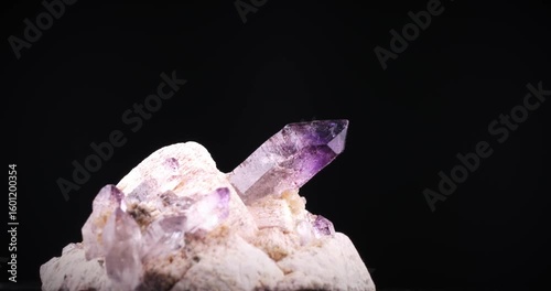 Amethyst from Erongo, Namibia. macro footage detail texture background. close-up mineral crystal unpolished semi-precious gemstone