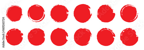 Set of red grunge circles. Stamp with jagged edges. Japanese sun isolated on white background.
