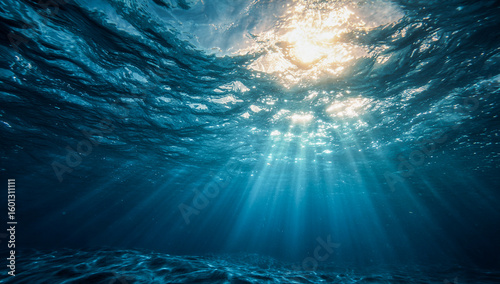 Underwater View of Sunlight Piercing Waves from Below – Ideal for Cinematic Ocean Backgrounds or Peaceful Banner Designs