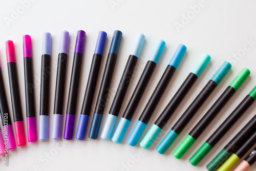  Markers in Rainbow Order on a white Backdrop