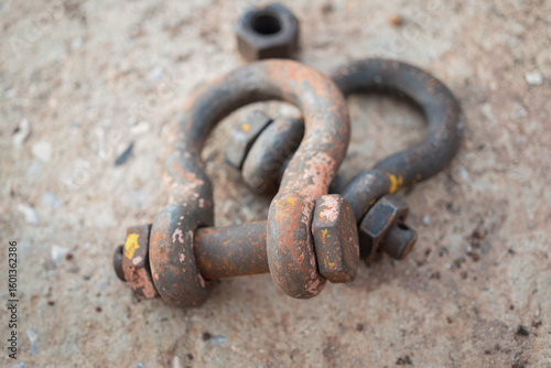 Iron steel shackles, heavy lifting equipment. Industrial object photo.