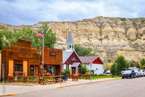 Billede på lærred Medora vintage town street view with mountains in the back