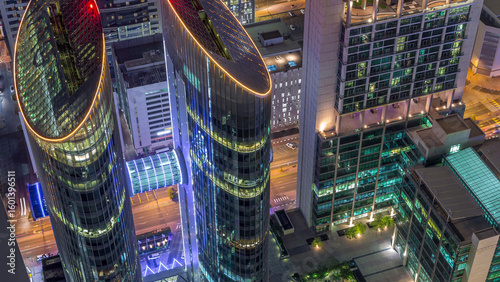 Photography Skyline of the buildings of Sheikh Zayed Road and DIFC aerial night timelapse in Dubai, UAE
