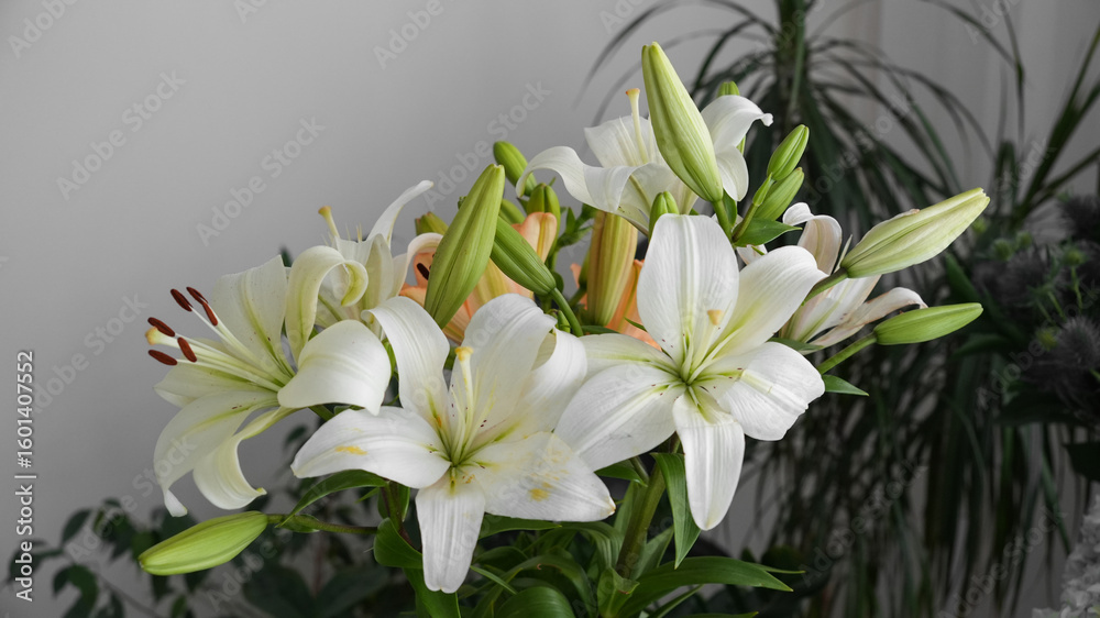 Fototapeta premium bouquet of white and orange lilies