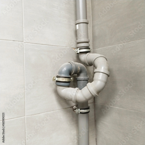 Plumbing masterpiece: connecting water pipes.