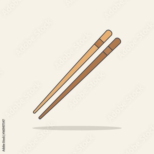 Two wooden chopsticks diagonally arranged on a light beige background with a shadow.