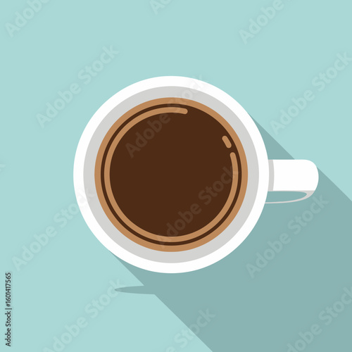 Top view of a cup of coffee on a light blue background.