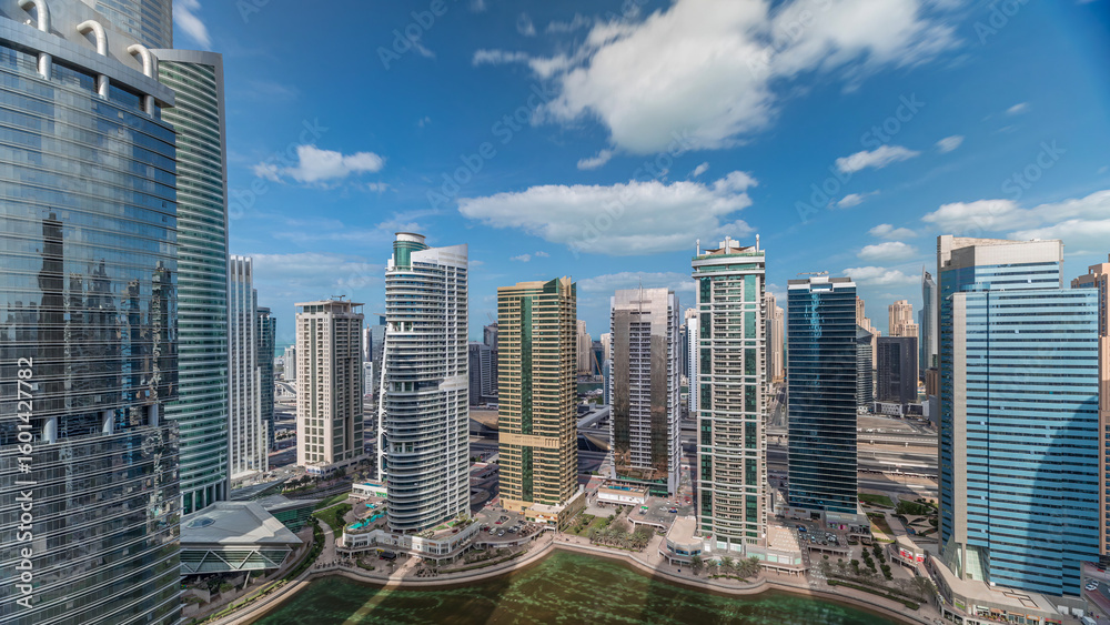 Fototapeta premium Residential apartments and offices in Jumeirah lake towers district timelapse in Dubai
