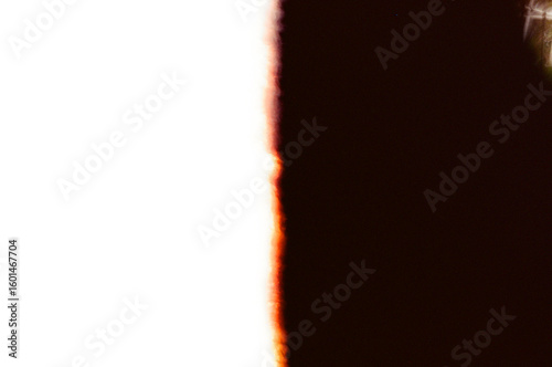 Surreal abstract black and white contrasts and textures created naturally by a 35mm film burn. Perfect for designs needing a vibrant artistic background or creative element to attract attention.