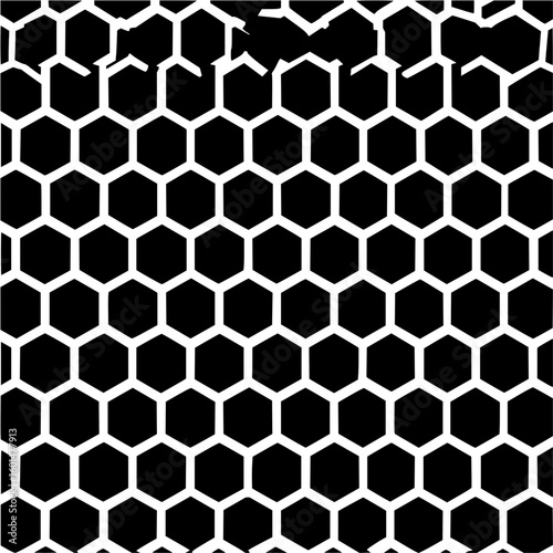 A dense arrangement of white outlined hexagons on a black background with partial completion at the top