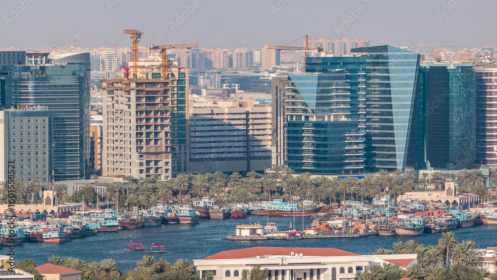 Obraz premium Aerial view of neighborhood Deira with typical buildings timelapse, Dubai, United Arab Emirates