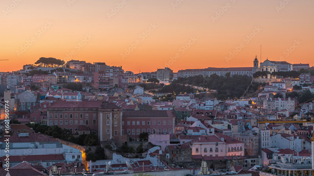 Fototapeta premium Lisbon aerial cityscape skyline night to day timelapse from viewpoint of St. Peter of Alcantara, Portugal