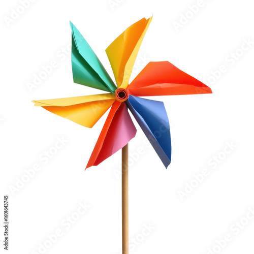 Colorful pinwheel spins in the wind on a sunny day outdoors