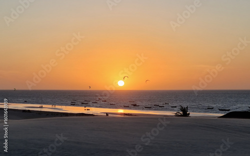 Sunset in Barrinha beach, near Jericoacoara with kitesurfers, Ceará, Brazil