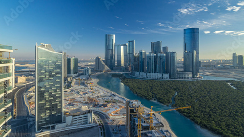 Buildings on Al Reem island in Abu Dhabi timelapse from above.