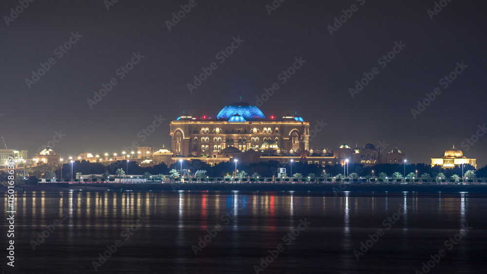 Obraz premium Emirates Palace illuminated at night timelapse, Abu Dhabi, United Arab Emirates
