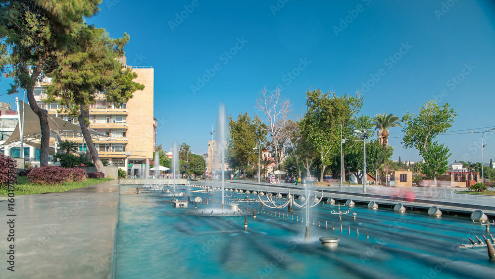 Fototapeta premium Singing and dancing fountains timelapse on the Republic Square. Antalya, Turkey