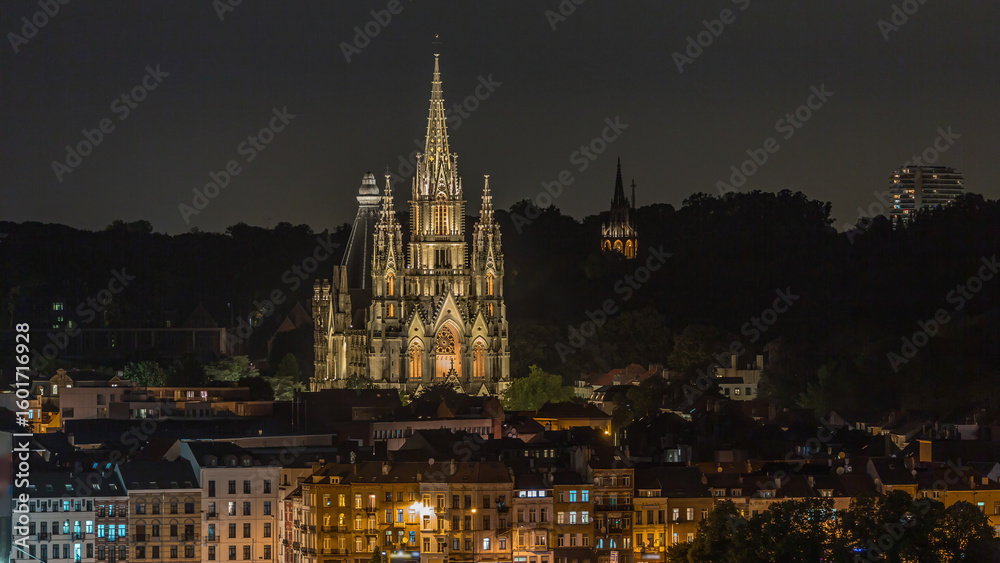 Fototapeta premium Aerial view of Notre Dame de Laeken church spires night timelapse in Brussels, Belgium.