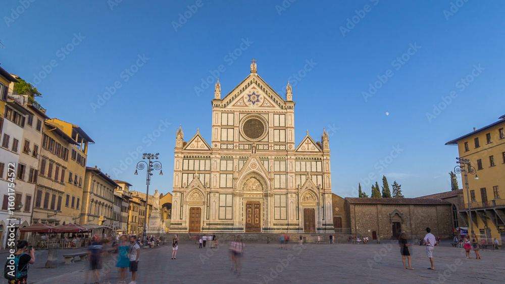 Fototapeta premium Tourists on Piazza di Santa Croce timelapse hyperlapse with Basilica di Santa Croce Basilica of the Holy Cross in Florence city.