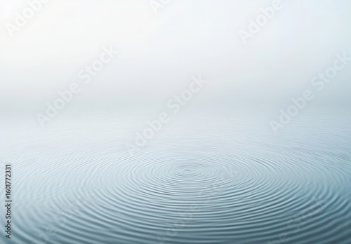 A serene, misty water surface with gentle ripples, creating a tranquil and dreamy atmosphere. Ideal for themes of calmness, reflection, and nature's beauty.