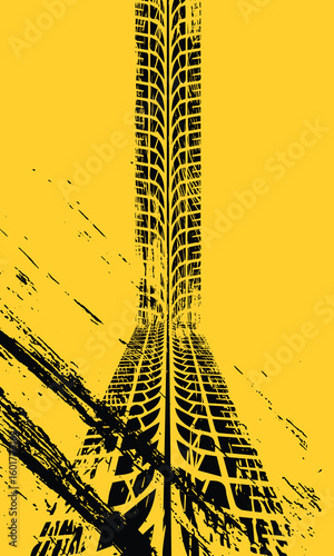 Abstract grunge tire tracks on yellow background