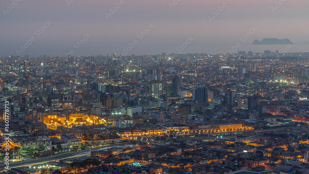 Obraz premium Aerial view of Lima skyline day to night timelapse from San Cristobal hill.