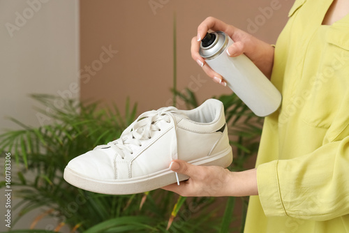 Woman with stylish sneaker ...