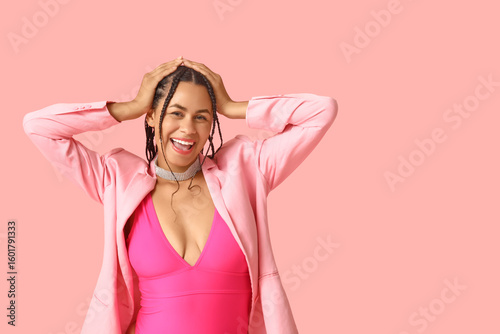 Excited young woman with br...