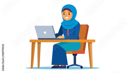 Smiling Muslim woman in a blue hijab working on a laptop at a wooden desk.