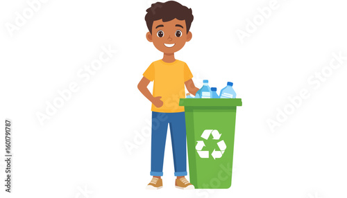 Smiling young boy in a yellow shirt recycling plastic bottles into a green bin.