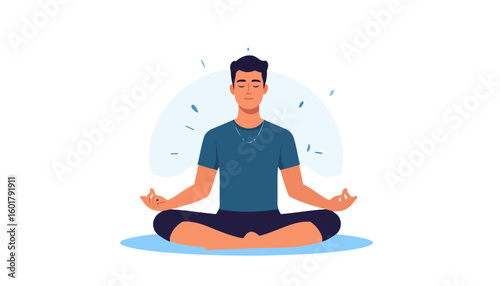 Serene young man with dark hair meditating in a blue shirt, sitting in a cross-legged lotus pose with closed eyes.