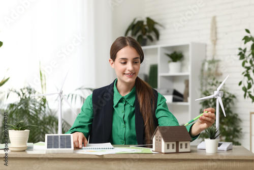 Female engineer with house ...