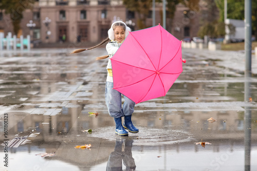 Cute little girl in gumboot...