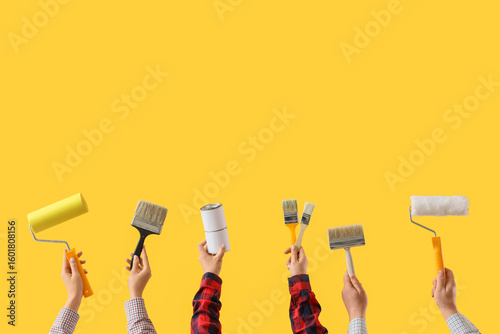 Many hands with painter's t...