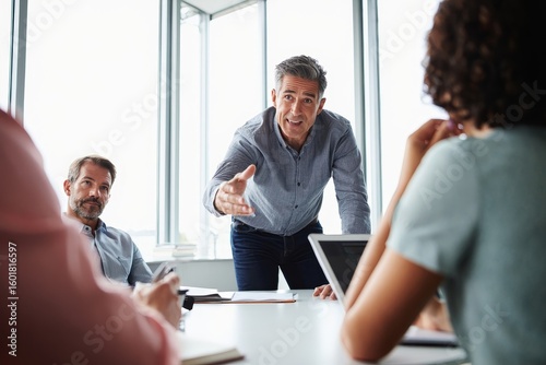 Business Meeting with Male Presenter and Team