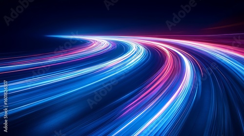 Vibrant streaks of light create a mesmerizing abstract highway at night
