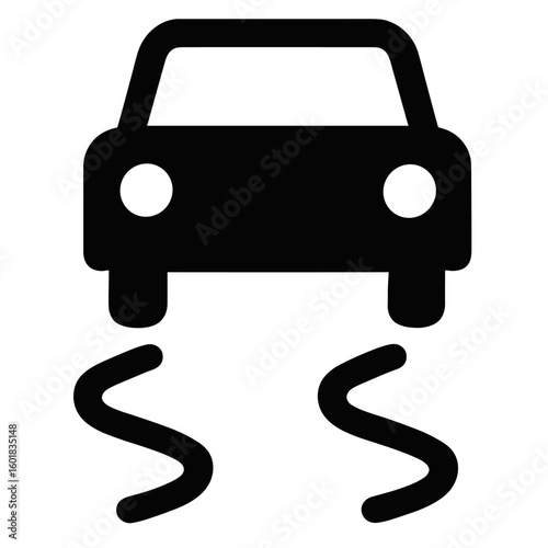 Car with skid marks indicating loss of control on a road during an icy winter day