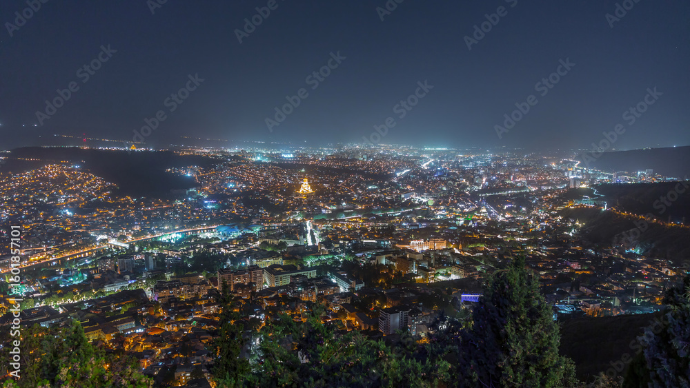 Obraz premium Tbilisi cityscape, Georgia day to night aerial timelapse. Top view over the city center and Kura river in Tbilisi.