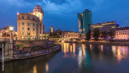 Photography Urania and Danube Canal day to night timelapse in Vienna.