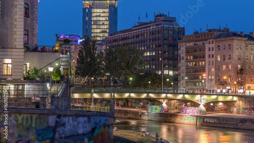 Canvas Print Vienna cityscape with the Danube channel day to night timelapse in Vienna