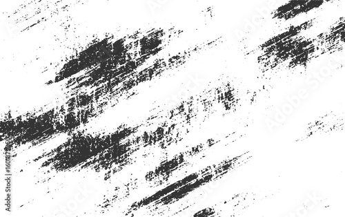 Abstract distressed grunge texture with dark brush strokes and scattered speckles background black
