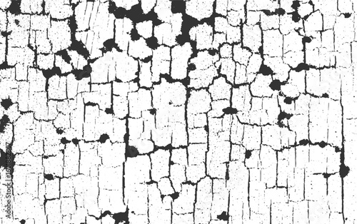 Cracked white surface with dark irregular patterns and small speckles abstract background