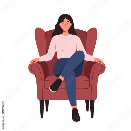 Young woman sitting confidently in vintage armchair with crossed legs  