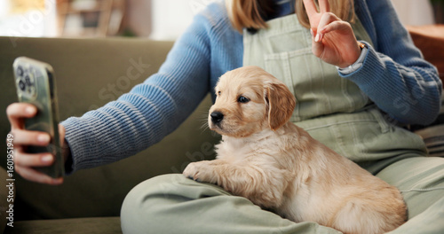 Canvas Print Owner, peace sign and selfie with puppy on lap of person in home living room for bonding, love or relax