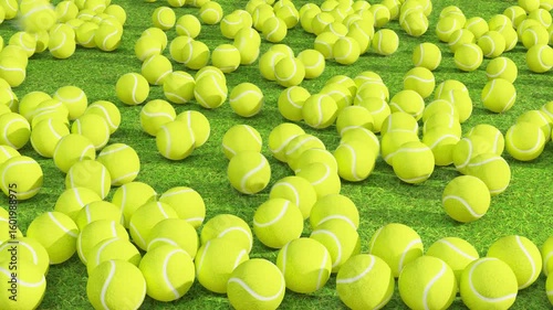 Random tennis balls shooting into an array of balls on a green grass surface